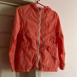 Zara Girls coral rain coat in size 13/14. Only used a couple times.